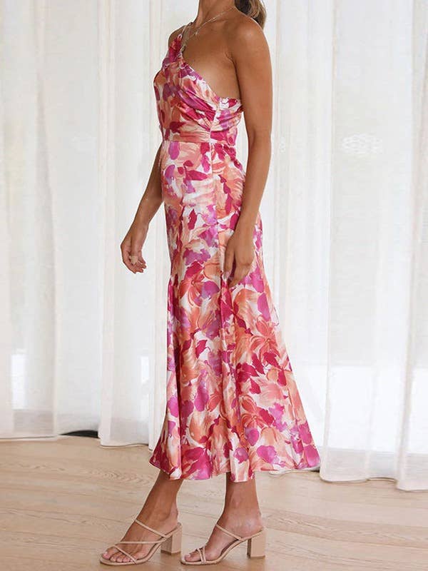 Peplum dress with sloping neck and waist