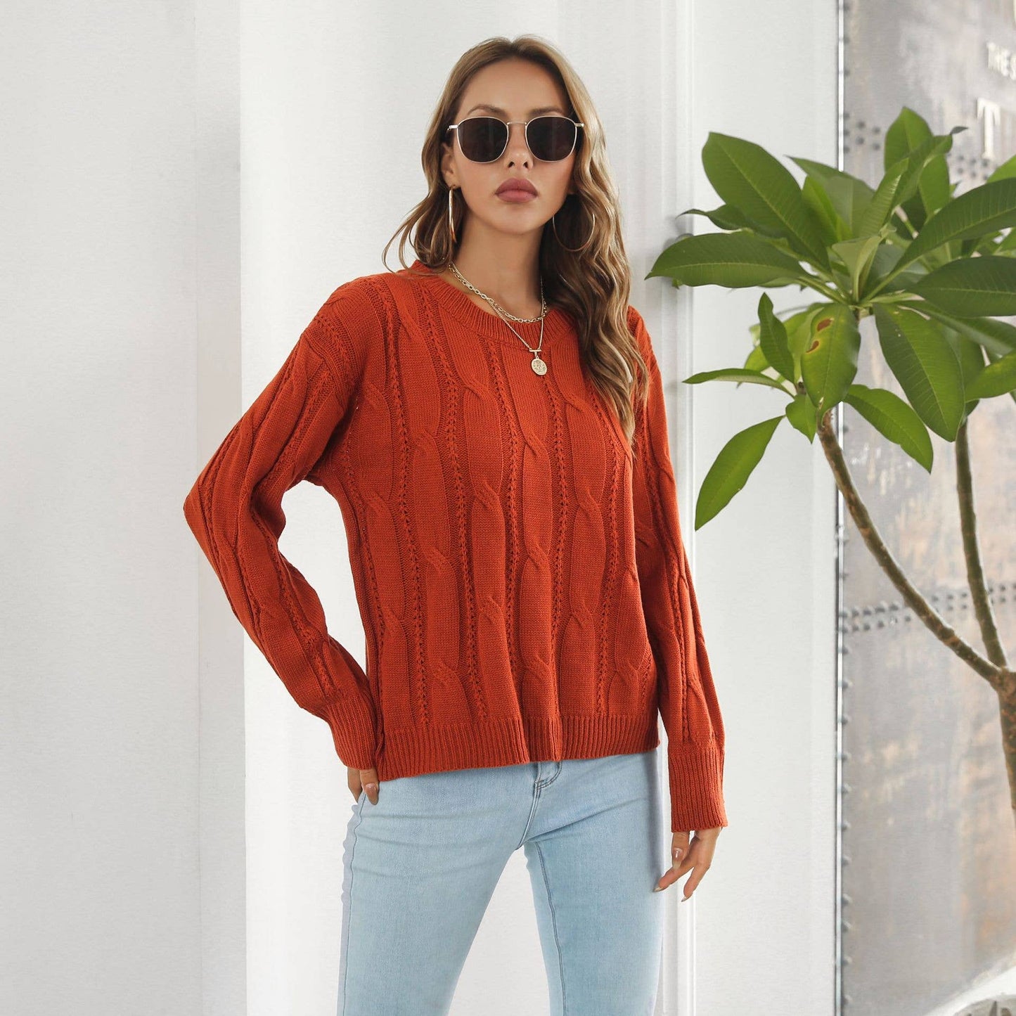 Twist hollowed loose long-sleeved sweater