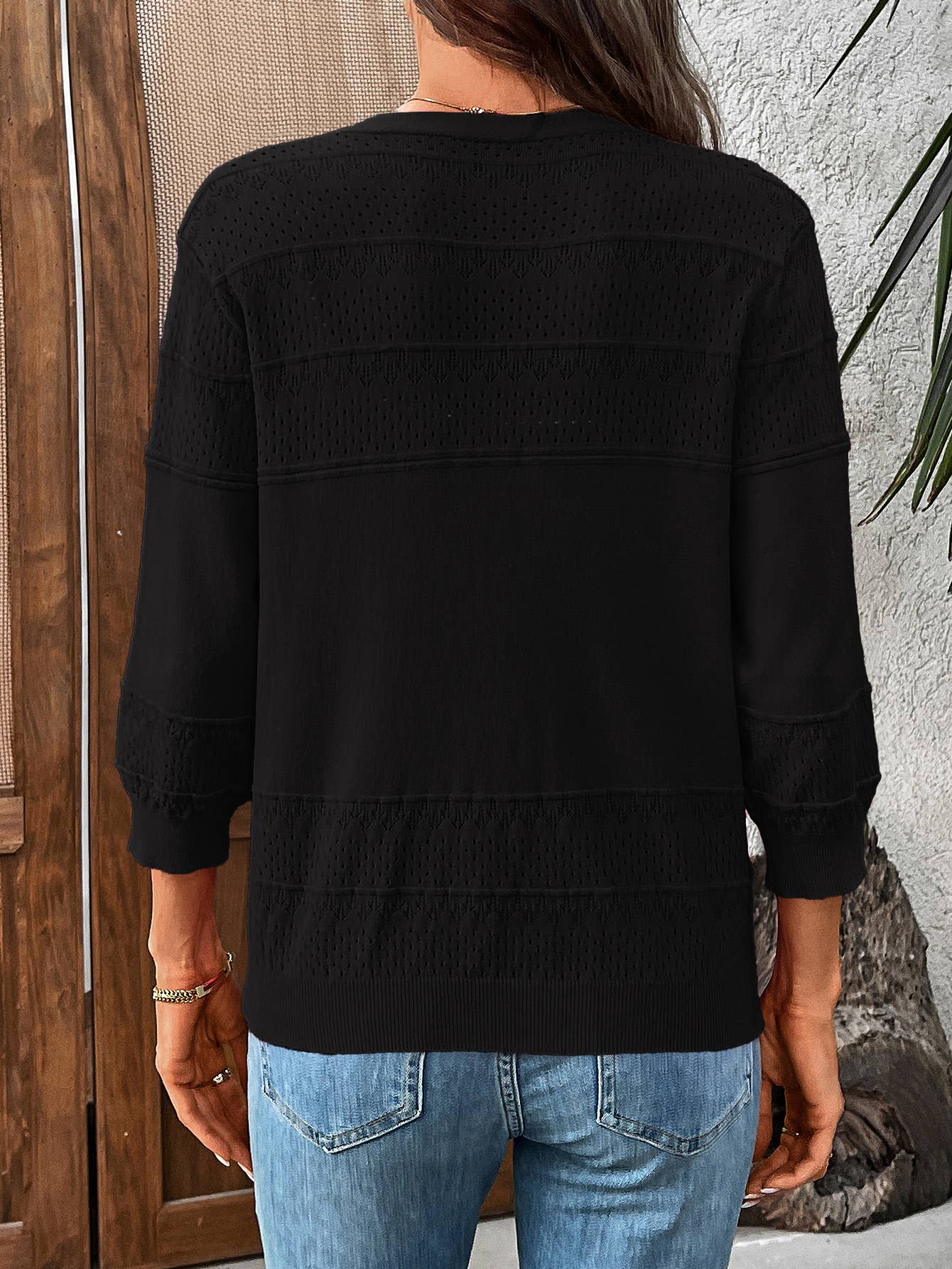 Three-quarter sleeve hollowed-out V-neck cardigan