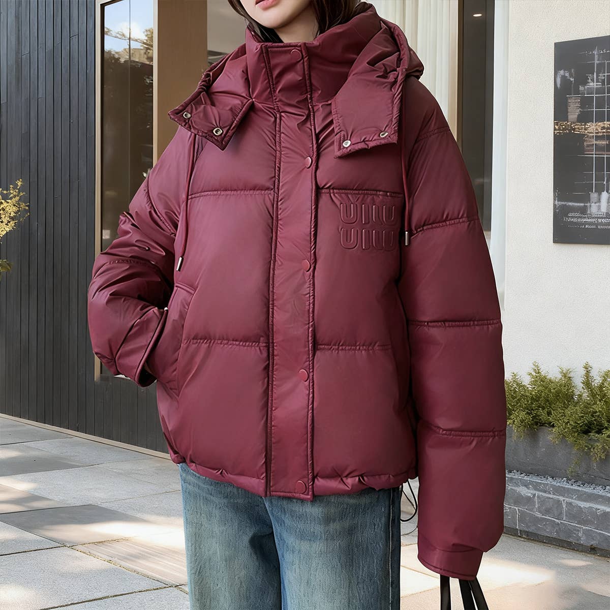 Hooded and textured short cotton-padded jacket