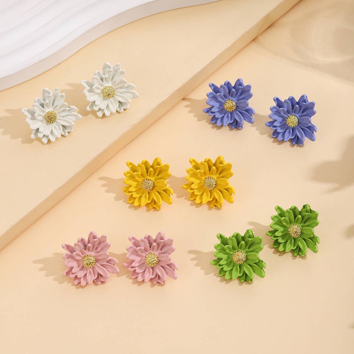 Spray-painted three-dimensional floral earrings