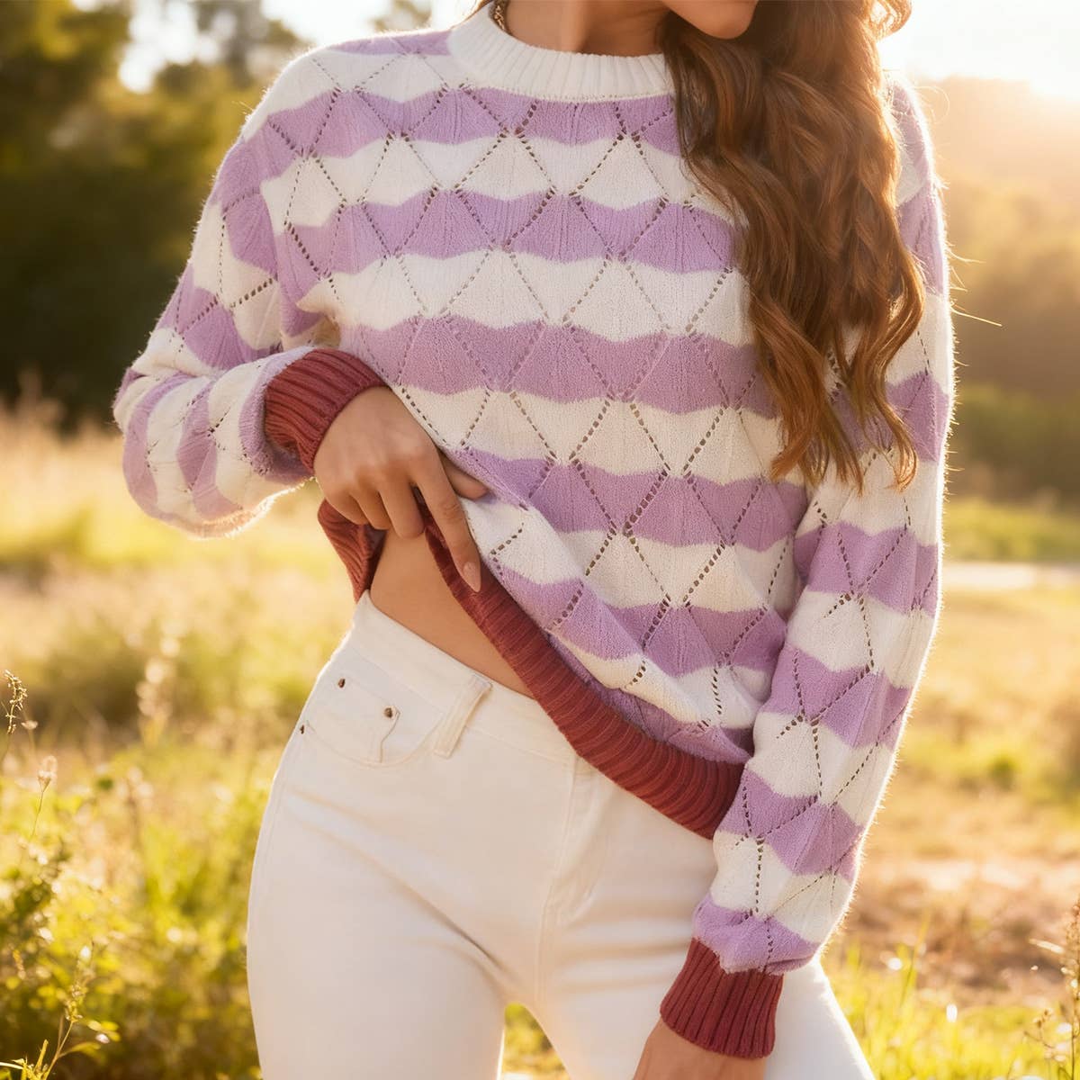 Round-neck diamond-shaped hollowed-out sweater