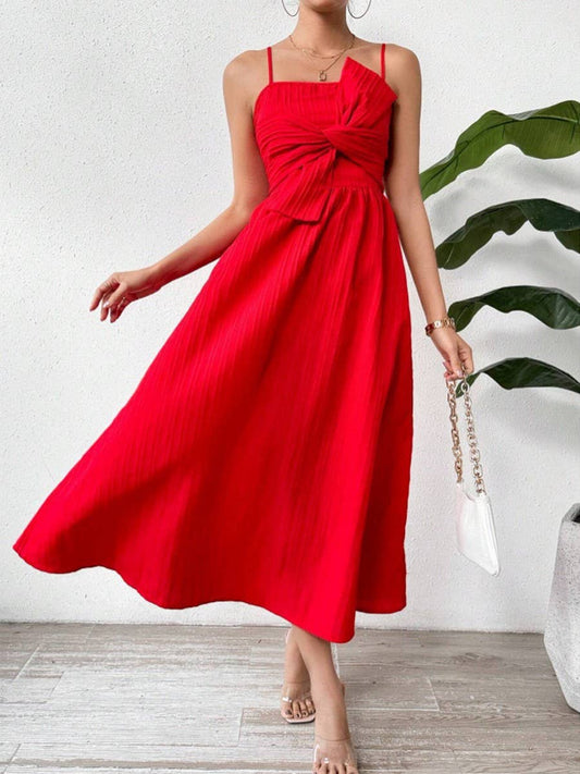 Solid color halter dress with a knotted front