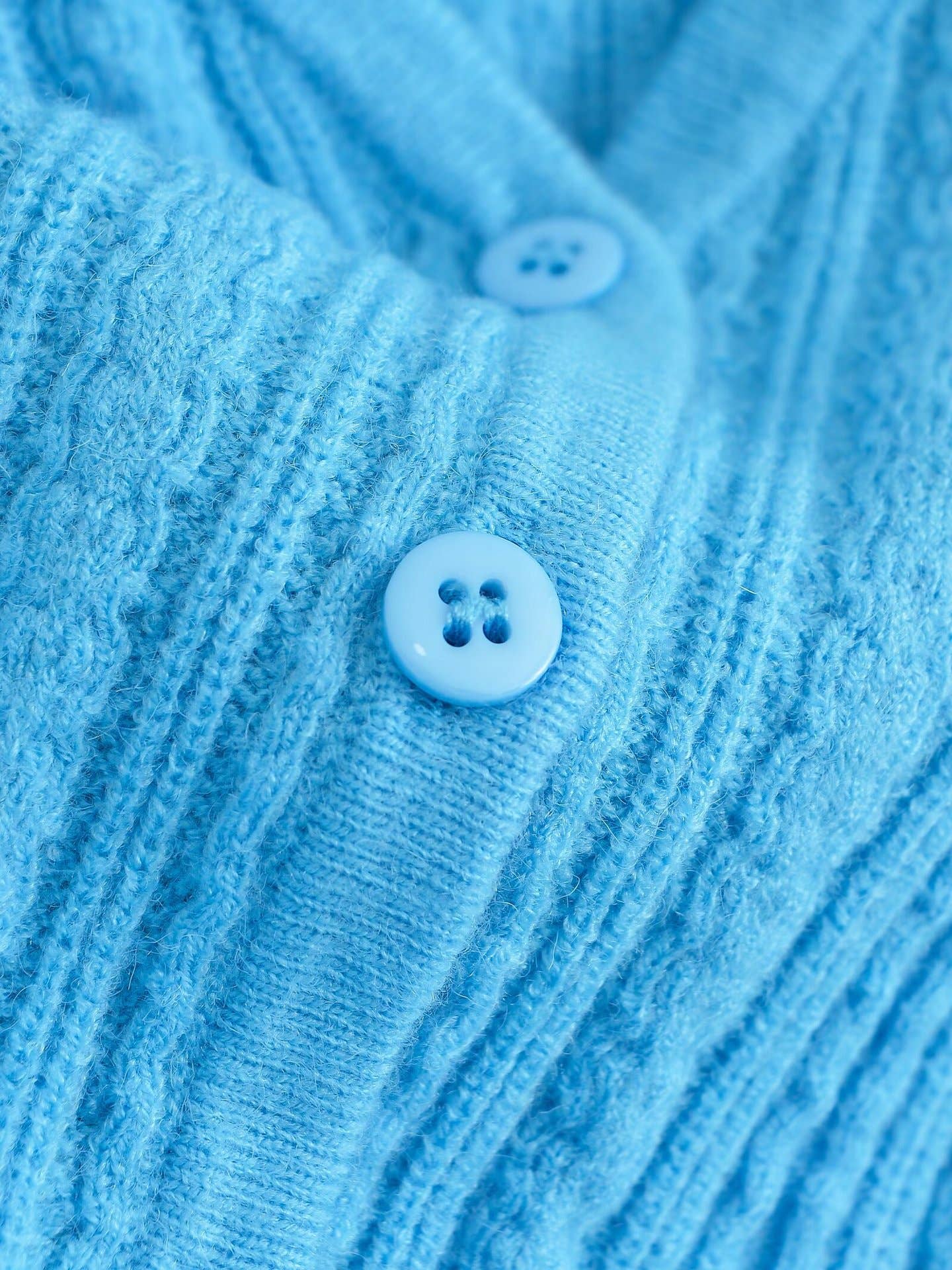 Solid-color V-neck long-sleeved knitted sweater