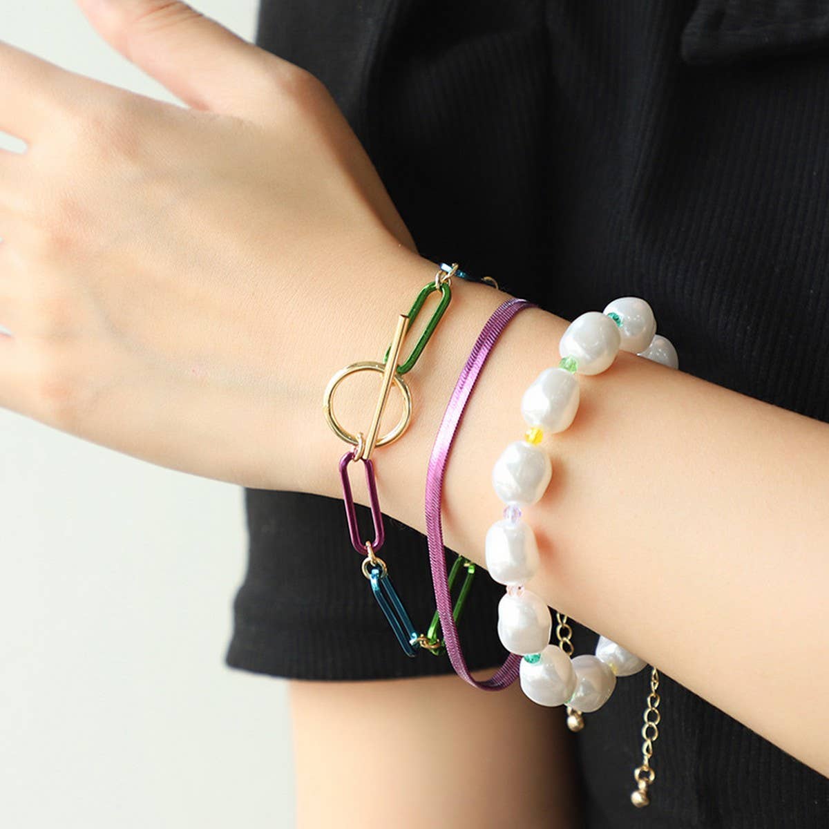 FASHIONABLE TASSEL EARRINGS AND STACKING BRACELETS