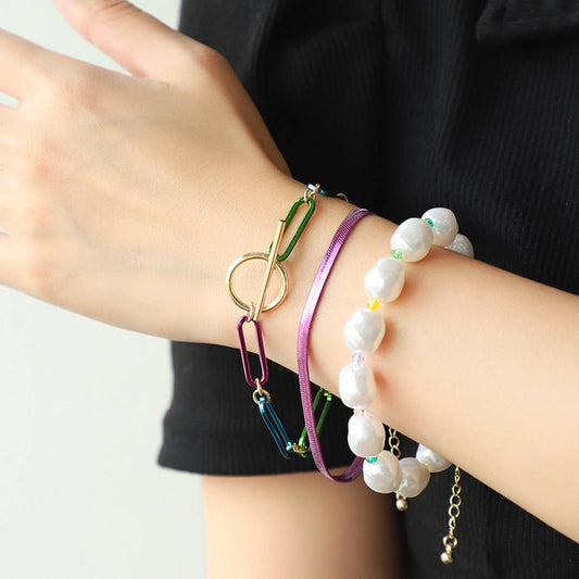 FASHIONABLE TASSEL EARRINGS AND STACKING BRACELETS