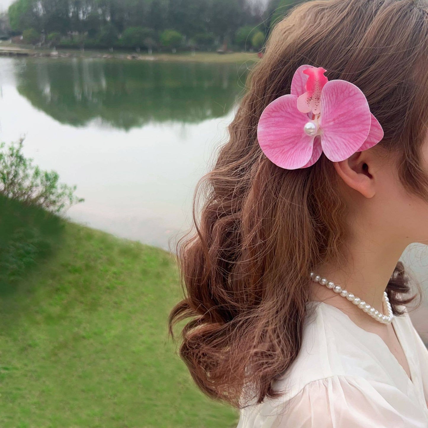 Sweet and realistic butterfly orchid hair clips