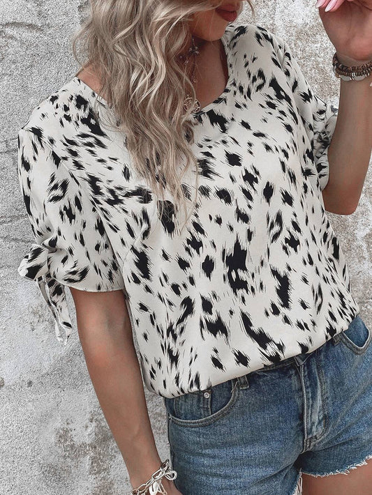 Leopard print blouse with round neck strap