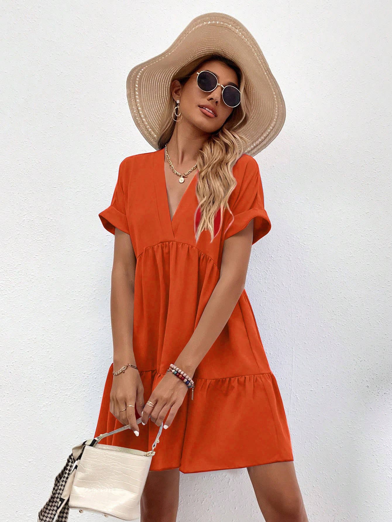 A casual, loose V-neck, large-hem short dress