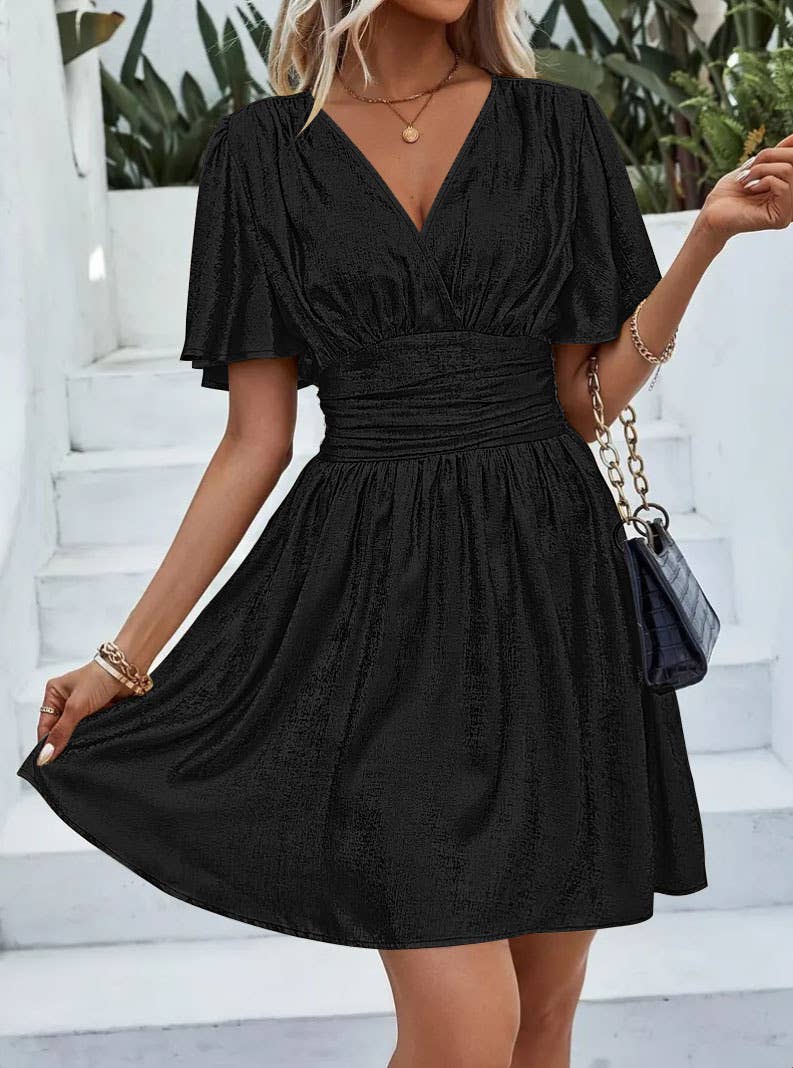 Solid-color lotus leaf sleeved pull-down dress