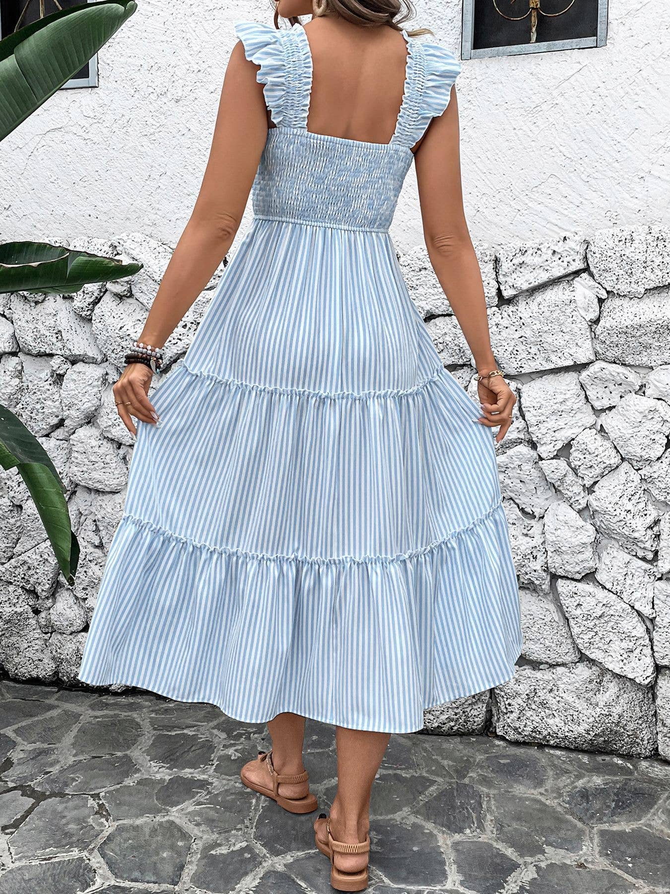 Resort-style striped ruffled strappy dress