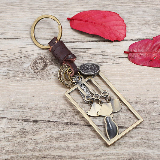 ALLOY BIRD PENDANT WOVEN LEATHER KEYCHAIN_CWMM5038