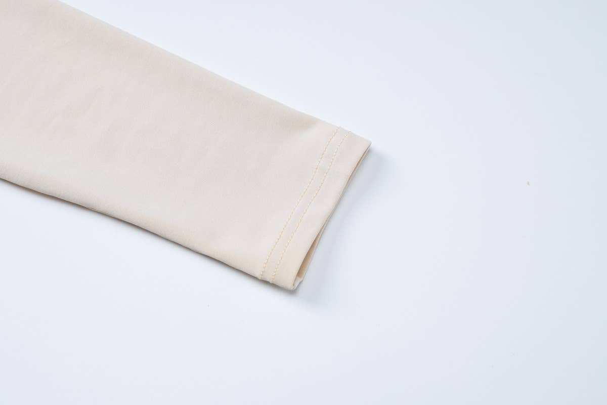 Long-sleeved top tight trousers and pleated suit