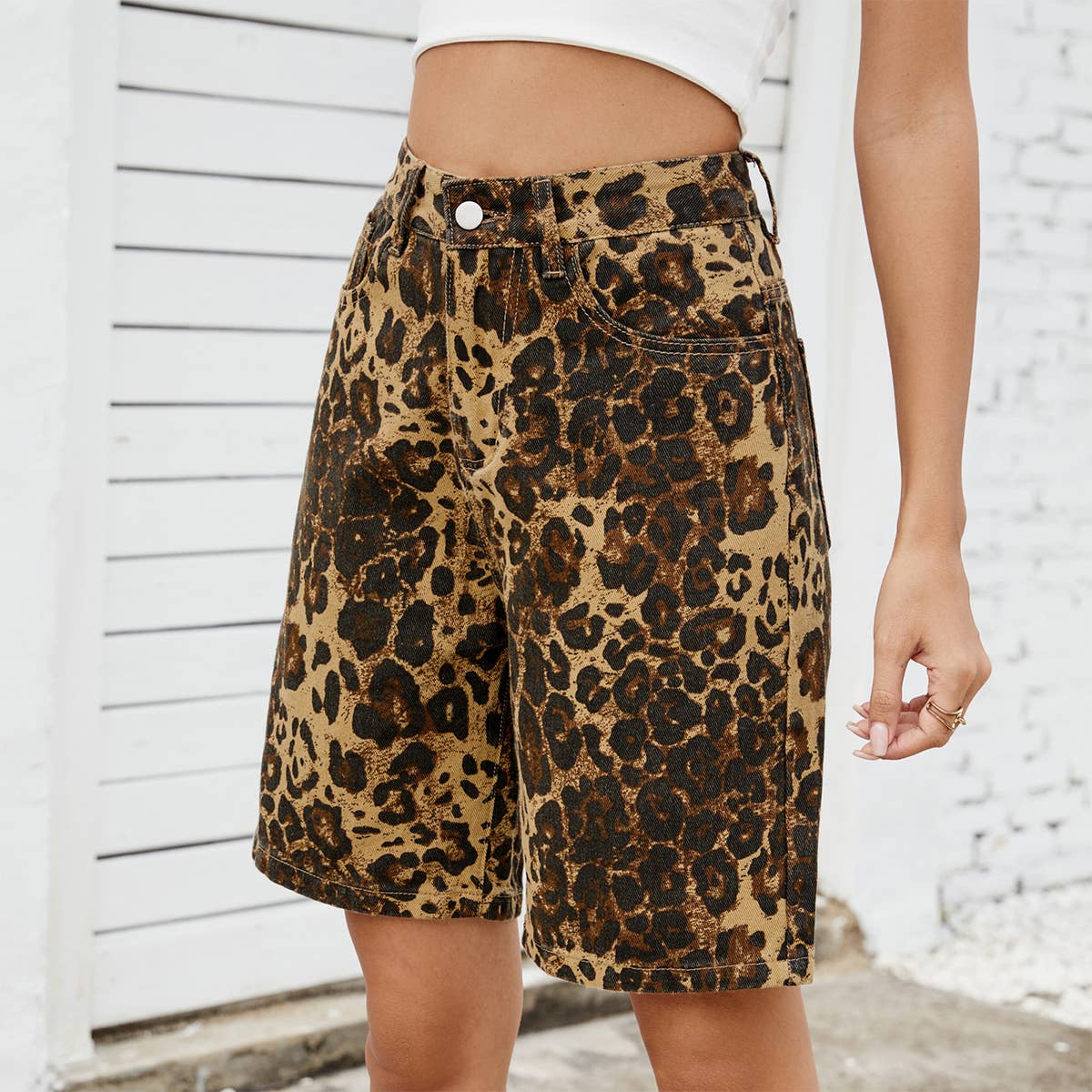 Washed vintage leopard print skinny denim shorts