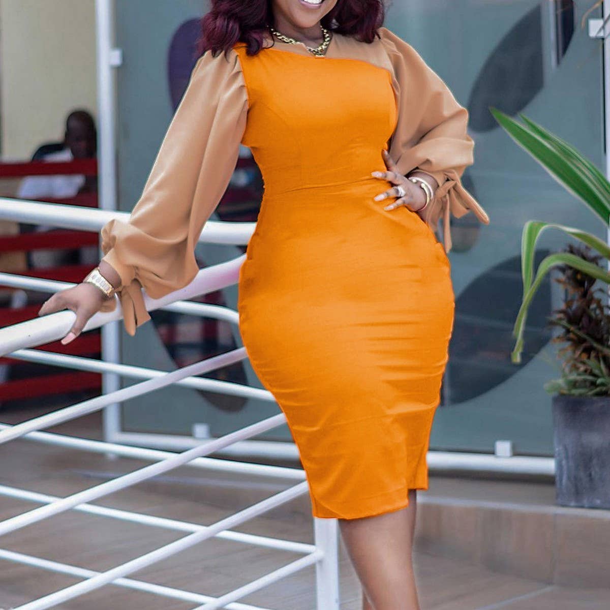 LONG-SLEEVED TIE-STRAP COLOR-BLOCKED DRESS