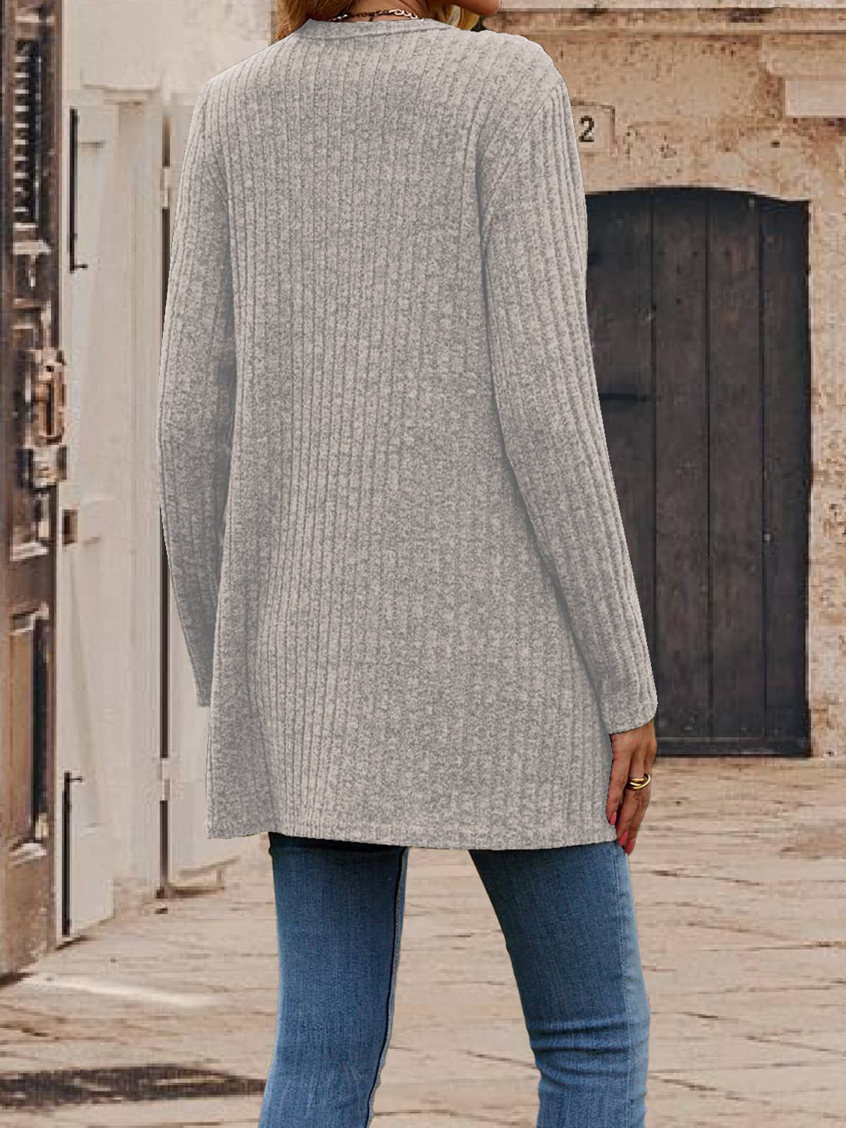 Single - buttoned V-neck pit strip cardigan