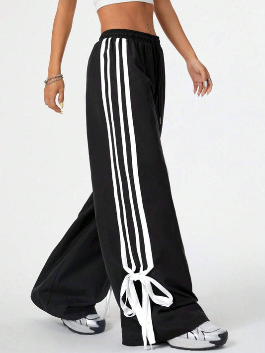 Slim, high-waisted, wide-legged trousers