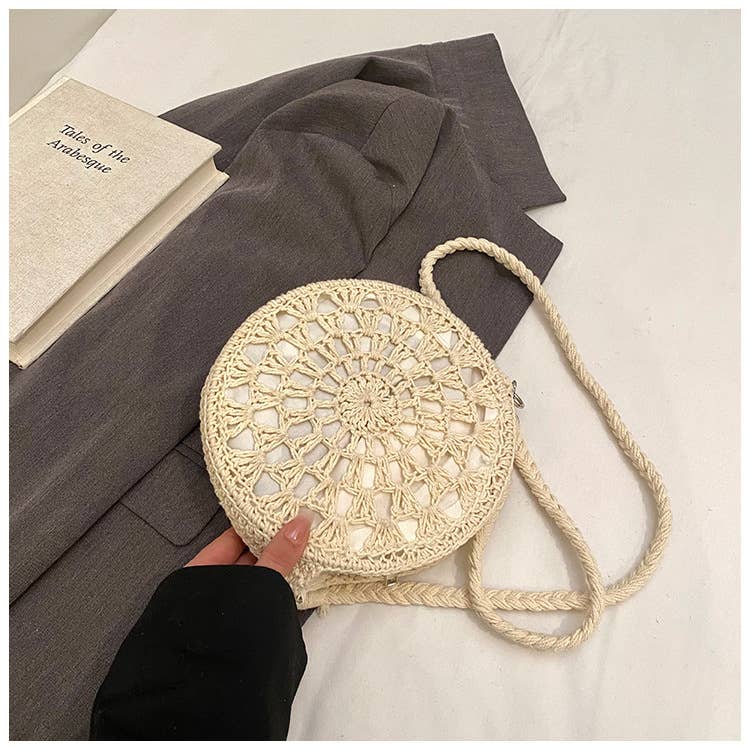 Fashionable hollowed-out woven crossbody bag