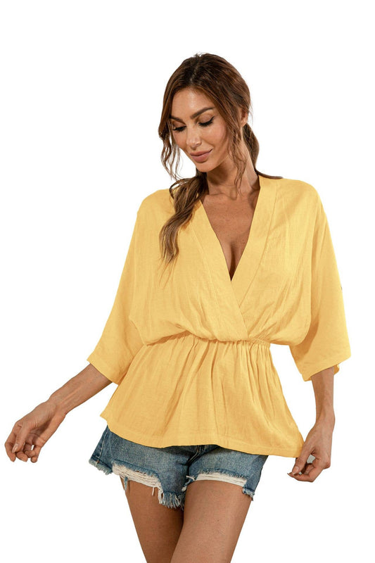 Solid color deep V-neck loose waist blouse