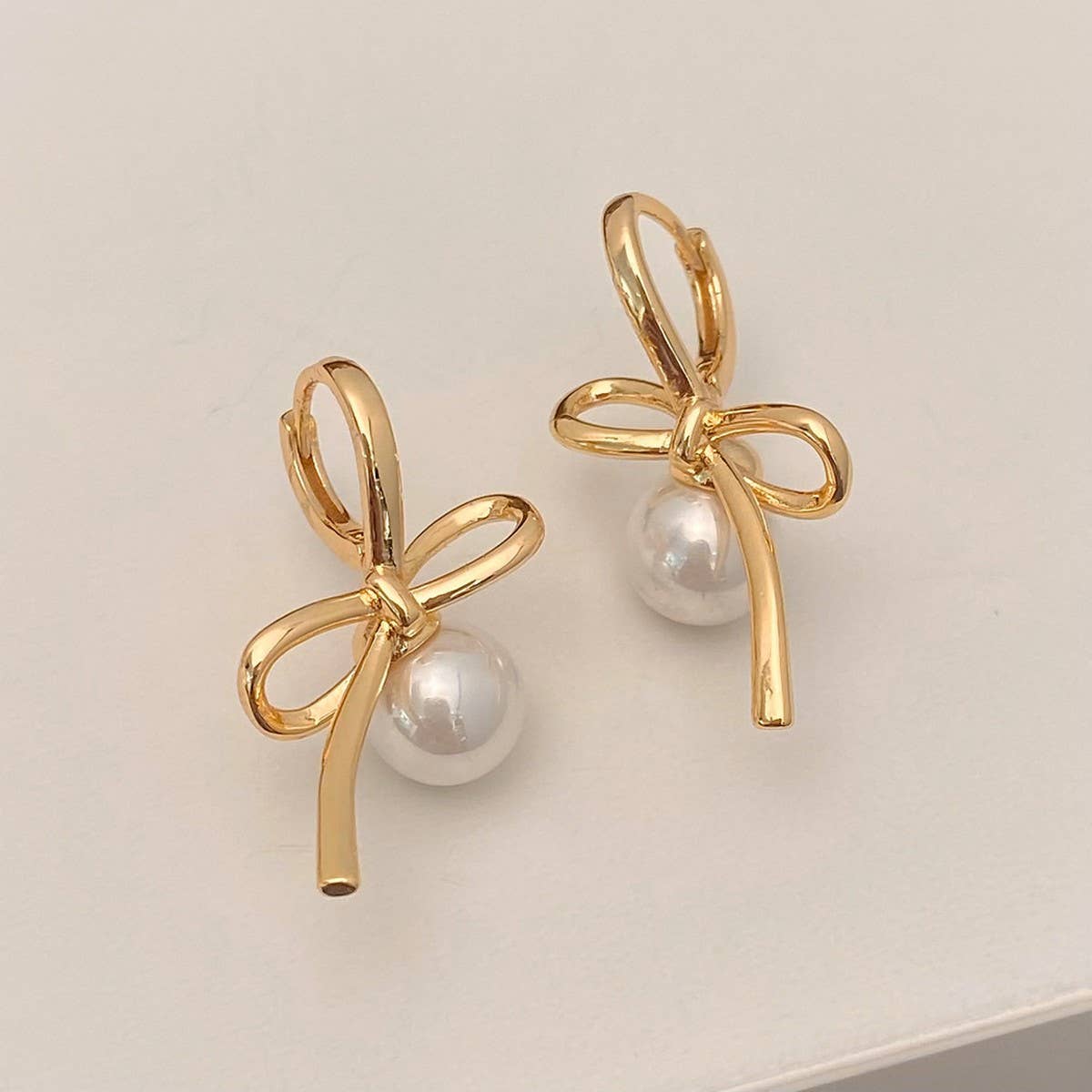 SIMPLE AND HIGH-END PEARL PENDANT BOW EARRINGS