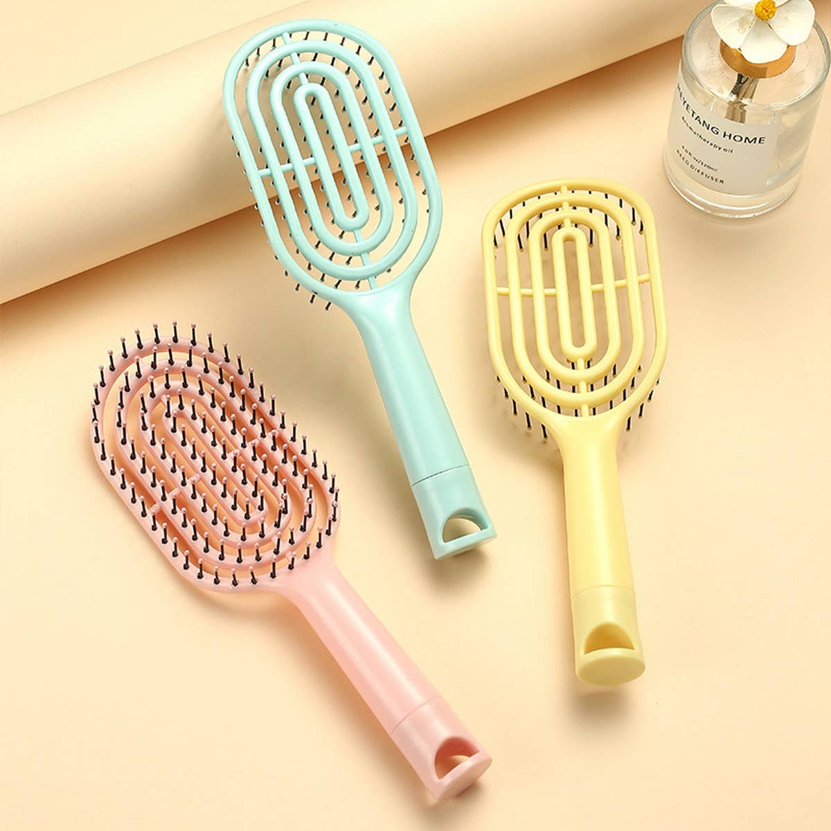QUICK-DRYING, TANGLE-FREE HANDLE MASSAGE COMB_CWAHA1879