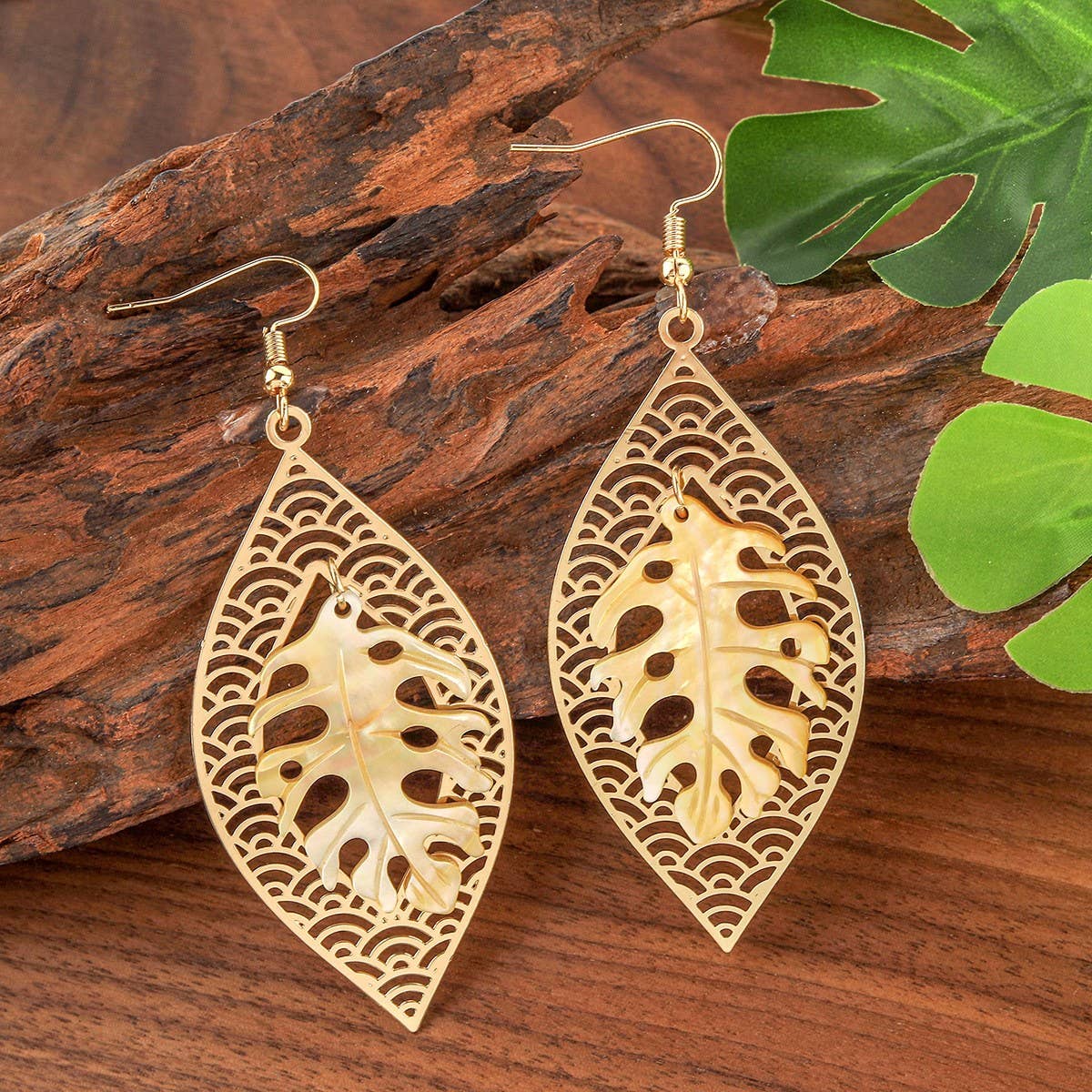 HOLLOW YELLOW SHELL LEAF CARVED EARRINGS