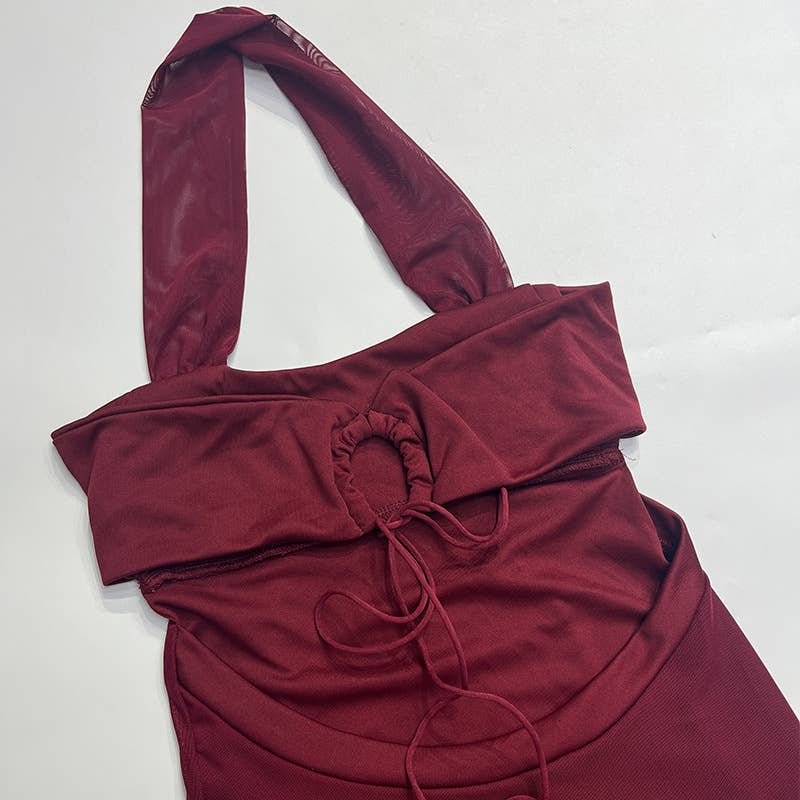 Long backless, cinched waist and neckline dress