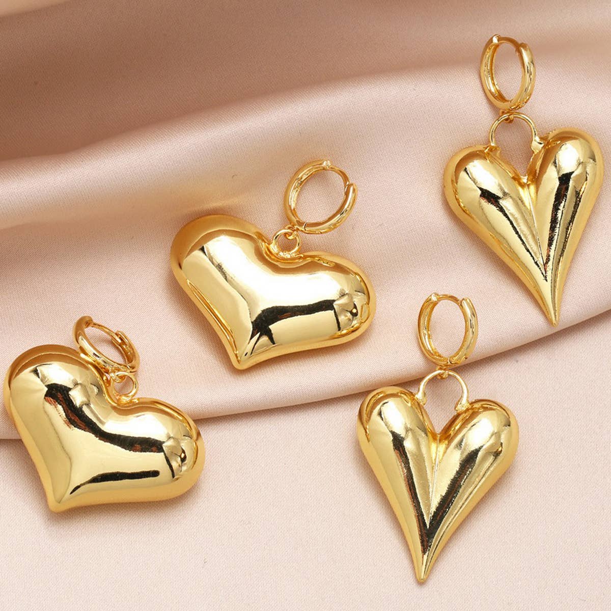 GOLD PLATED HEART-SHAPED PENDANT EARRINGS