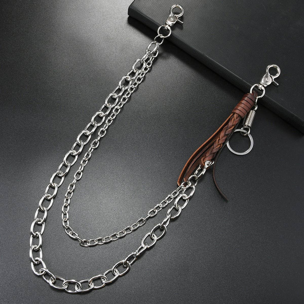 FASHIONABLE COWHIDE BRAIDED TASSEL PANTS CHAIN