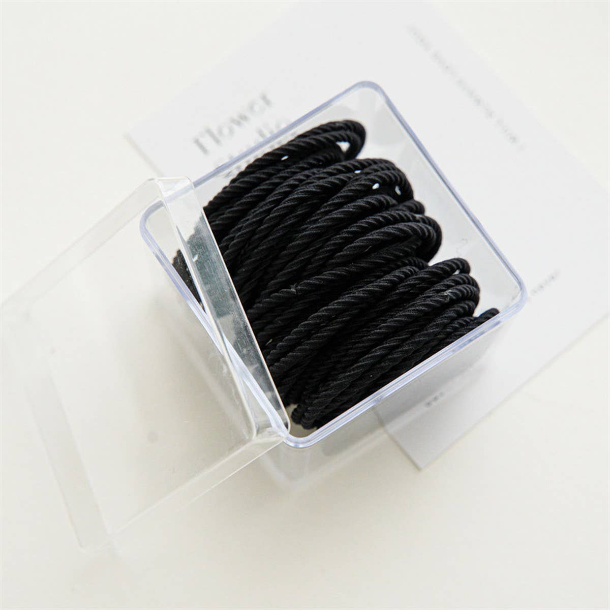 A BOX OF 50 SIMPLE AND DURABLE HAIR TIES_CWAHA1128