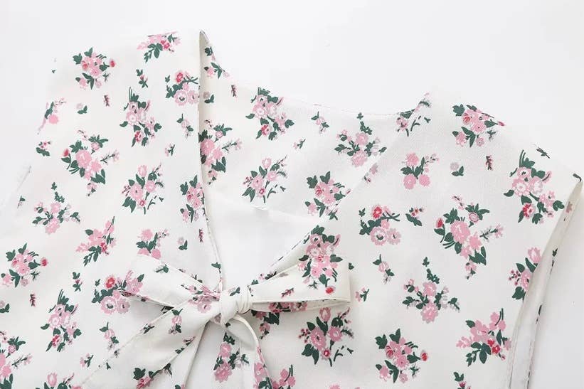 SHORT FLORAL PRINT STRAP VEST