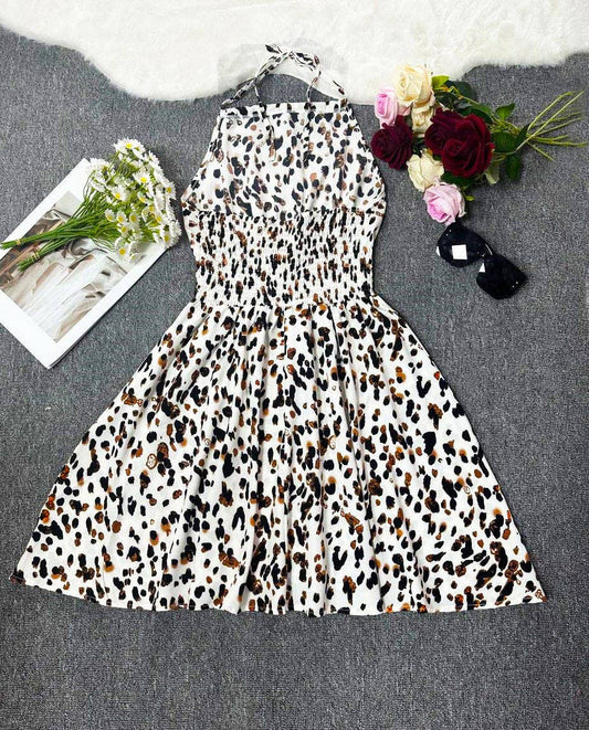 Sleeveless halter print vacation-style dress