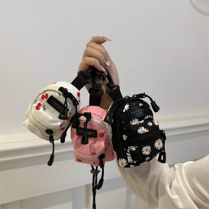 Printed mini lipstick headphones and small bag