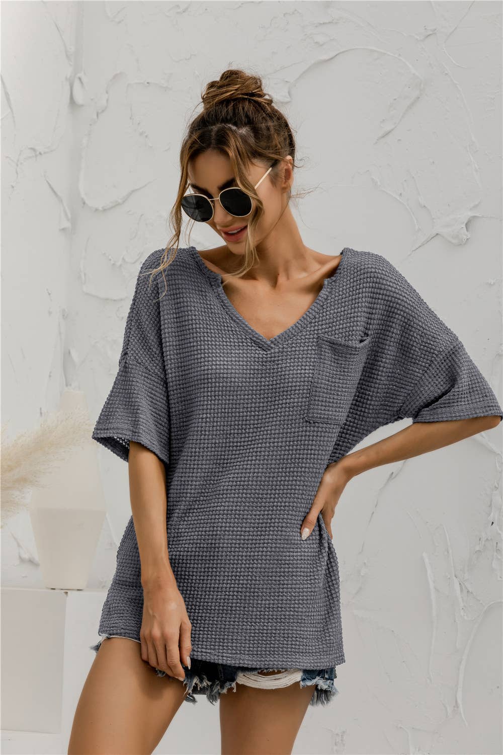 V-neck pocket slit solid-color knitted top