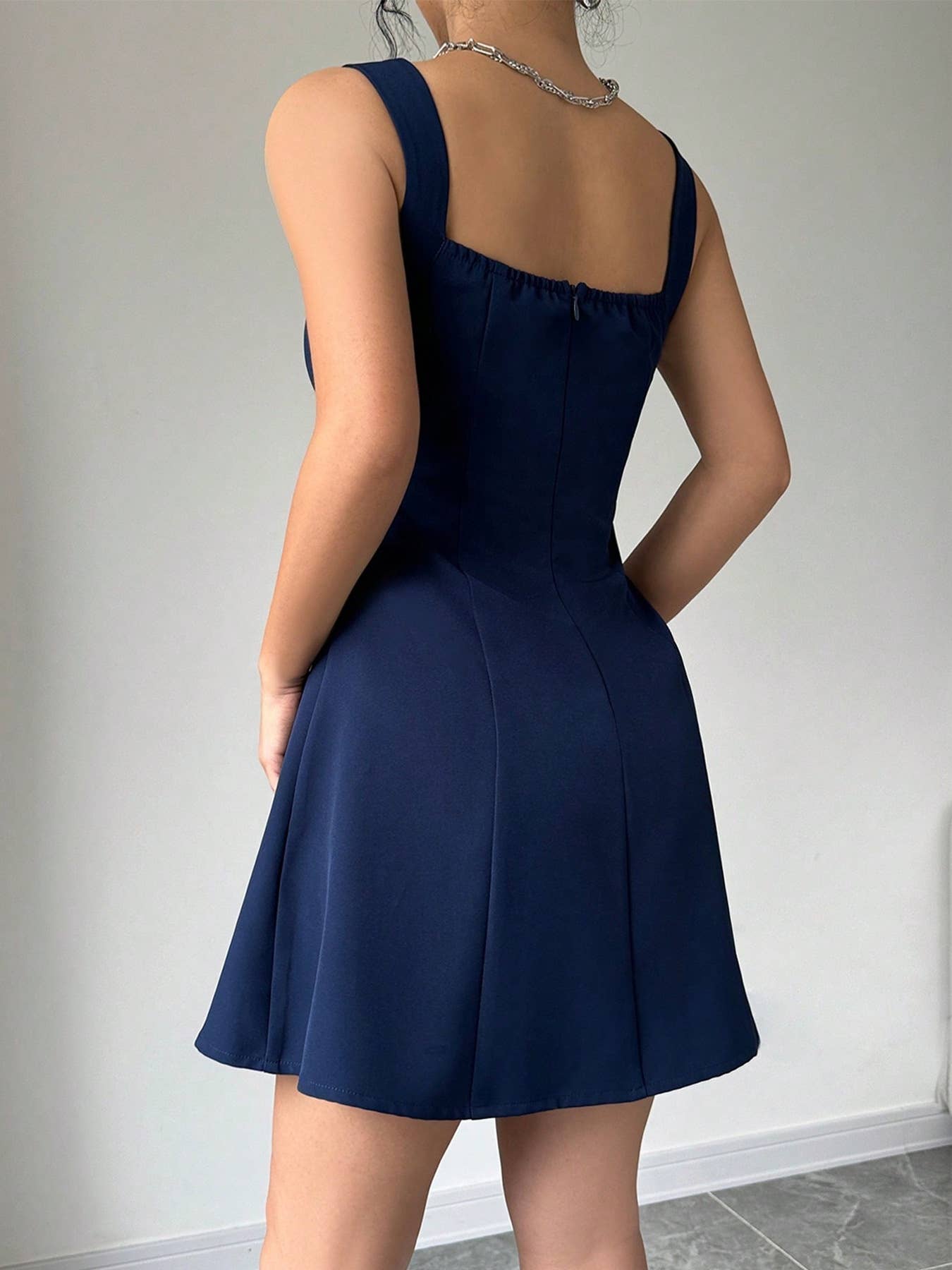 Waist-cinching short square-neck halter dress