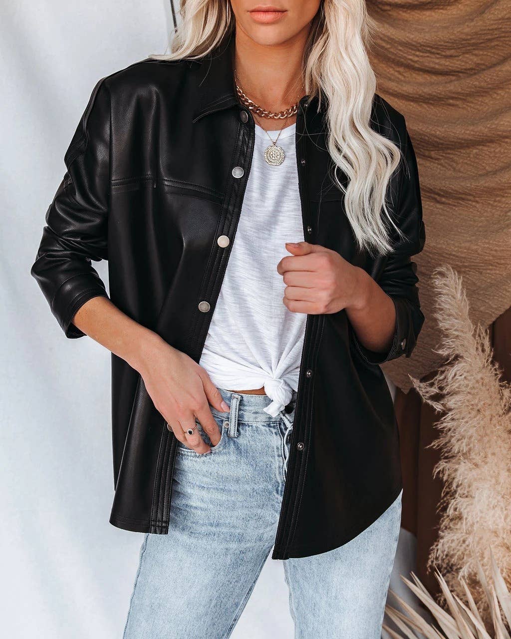 Lapel solid-color long-sleeved leather jacket