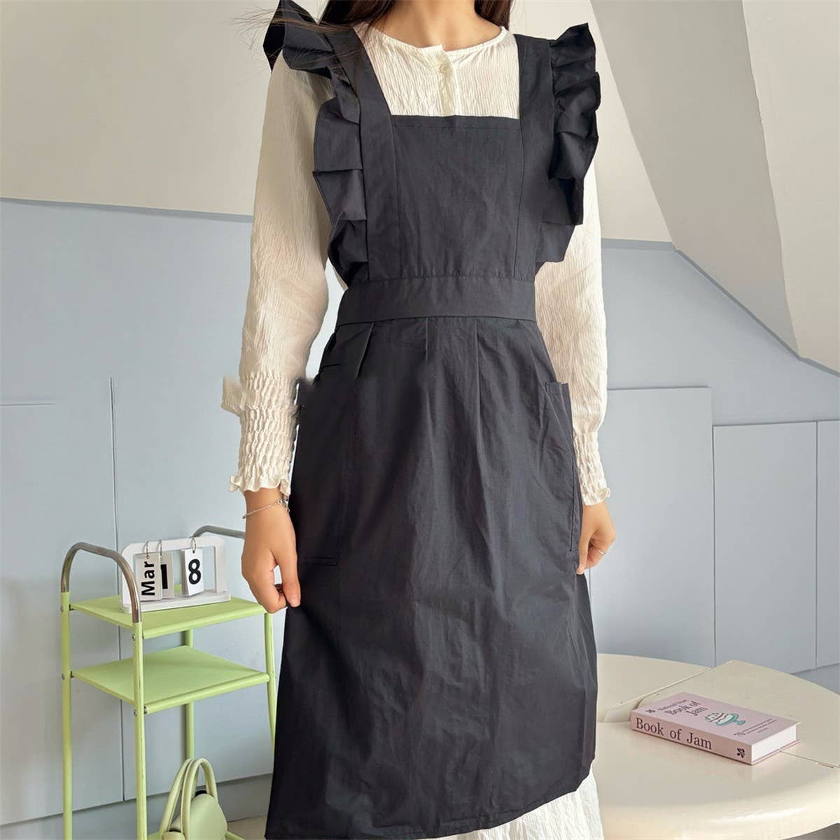 WATER-RESISTANT NYLON FLORAL RUFFLE CROSS APRON