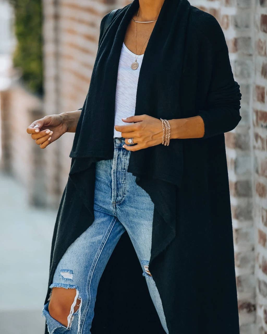 Large lapel unbuttoned solid color long cardigan coat