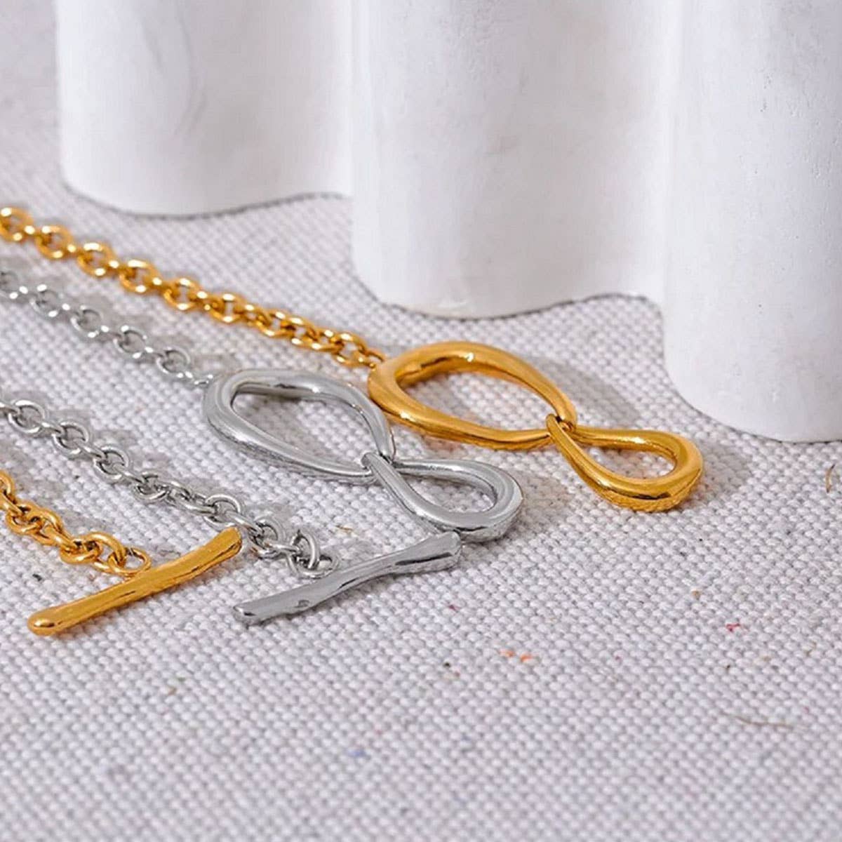 Titanium steel necklace with bow pendant