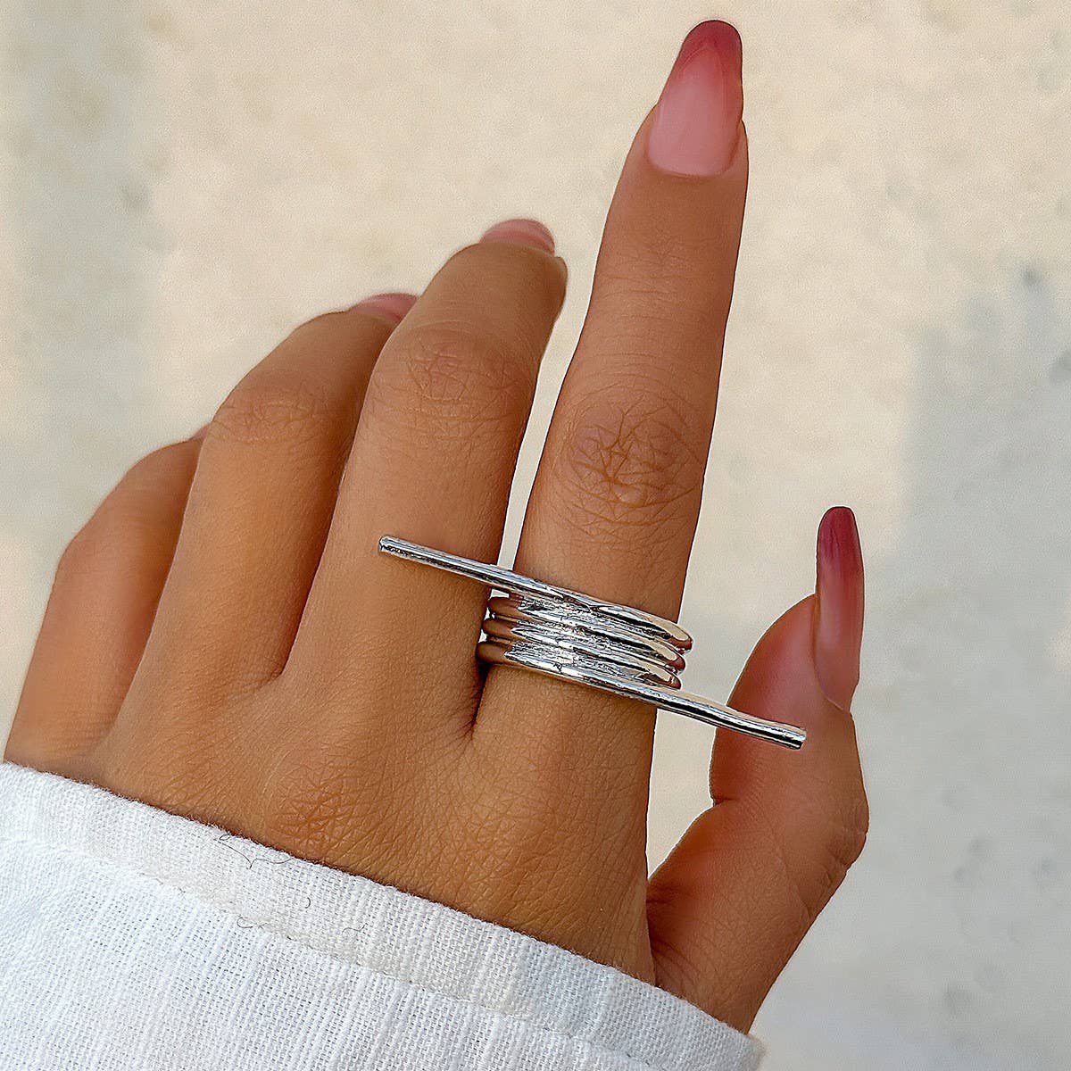 SIMPLE ASYMMETRICAL STATEMENT FRENCH RING