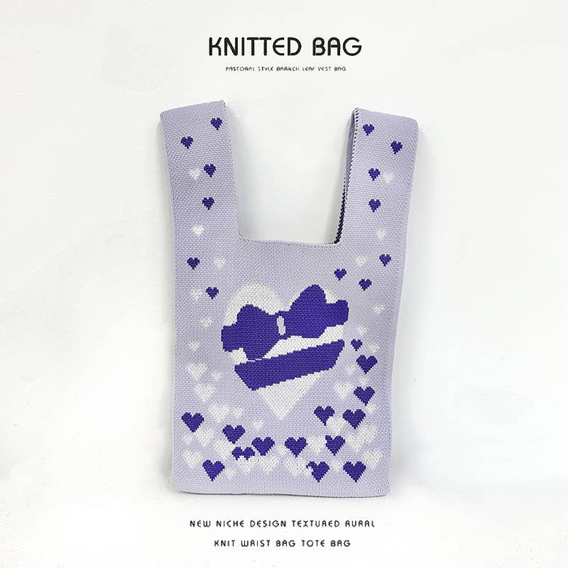 Heart-shaped color-blocked knitted handbag