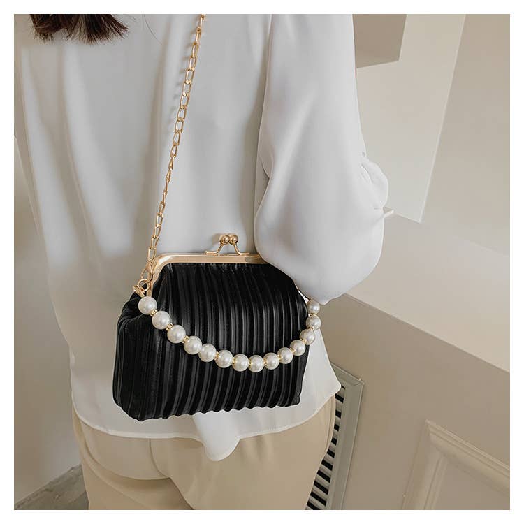 Pearl shell bag diagonally across the body