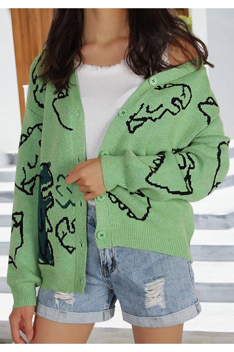 THE JACKET IS A LOOSE CARTOON DINOSAUR CARDIGAN
