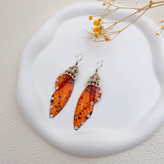 Elegant long earrings with cicada wing wings