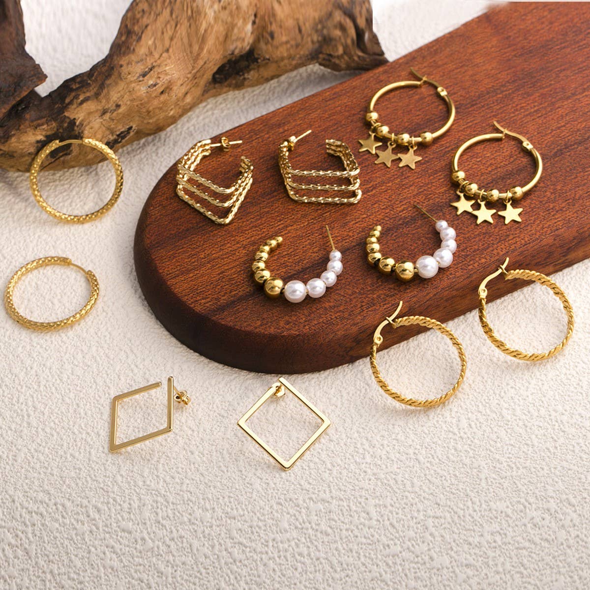 CIRCLE STAINLESS STEEL TWISTED DIAMOND EARRINGS