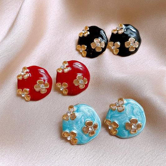ROUND HOLLOW FLOWER FASHION EARRINGS