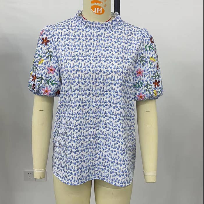 EMBROIDERED PRINTED TURTLENECK BLOUSE