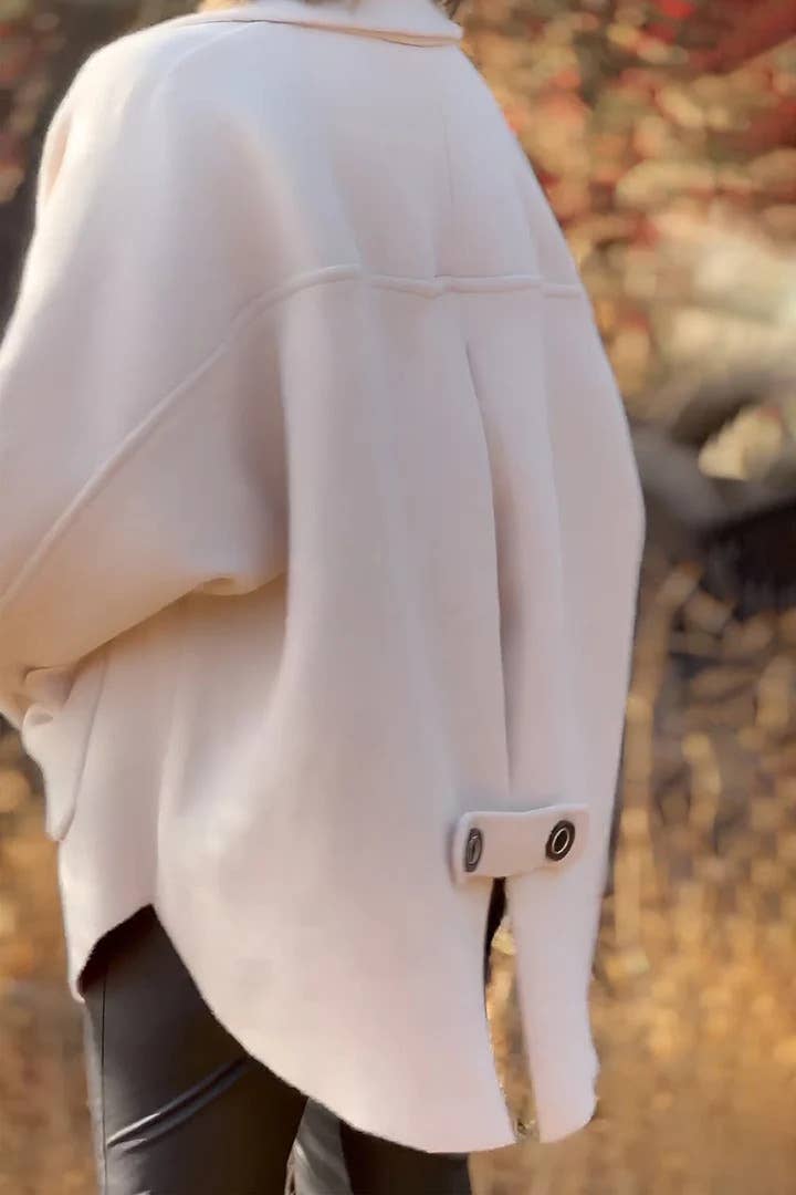 SINGLE-BREASTED WOOLEN COAT WITH LOOSE POCKETS