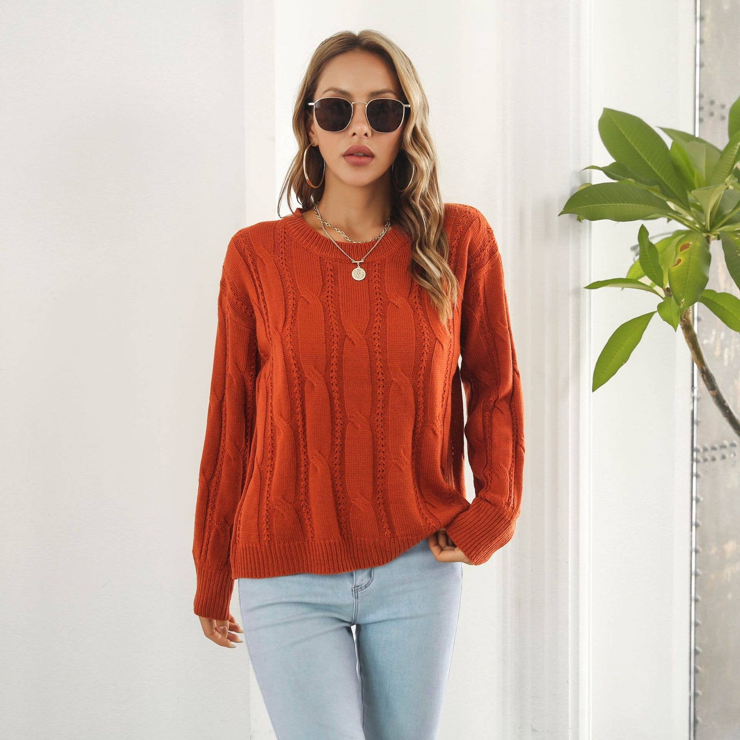 Twist hollowed loose long-sleeved sweater