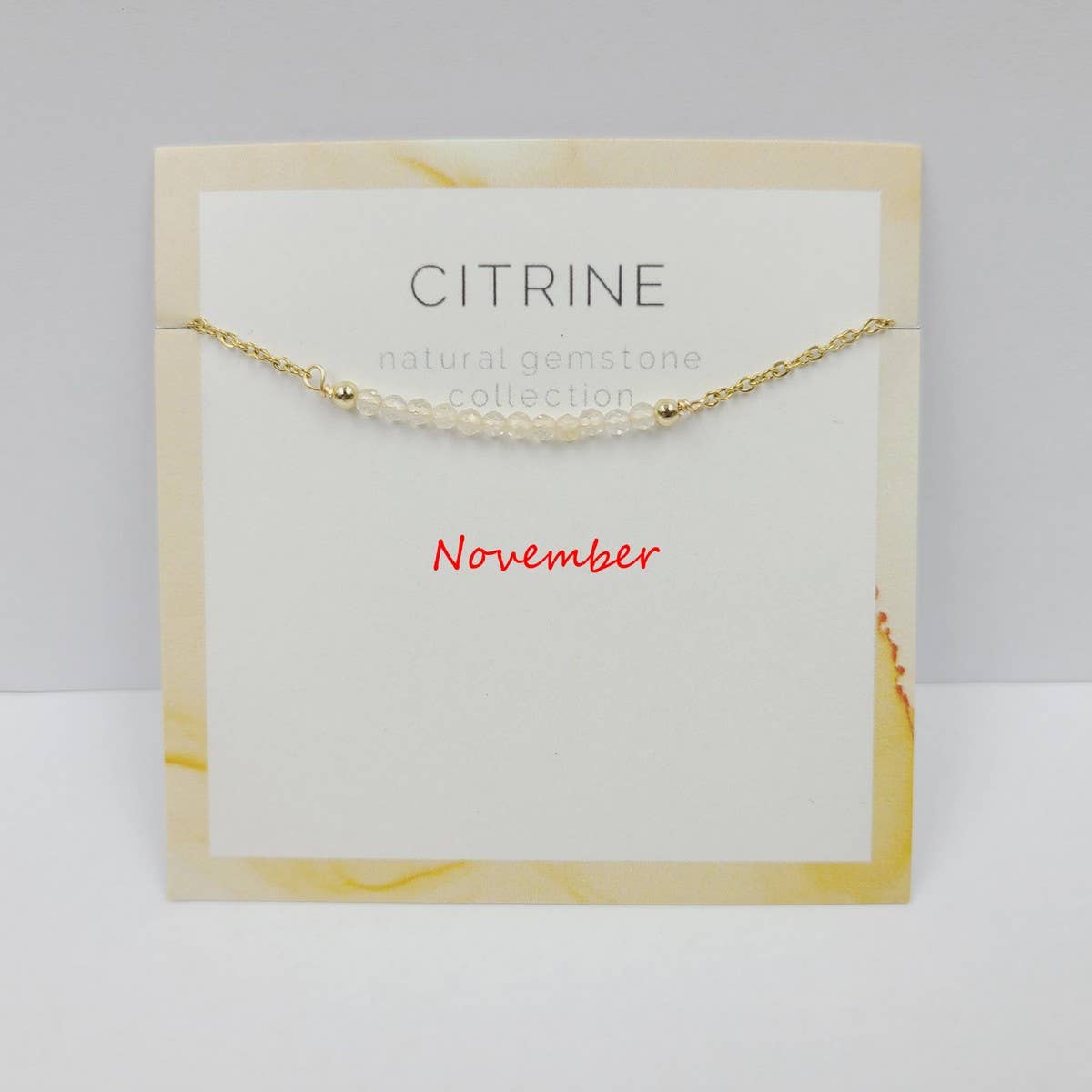 DECEMBER NECKLACE NATURAL STONE LOCK BONE CHAIN